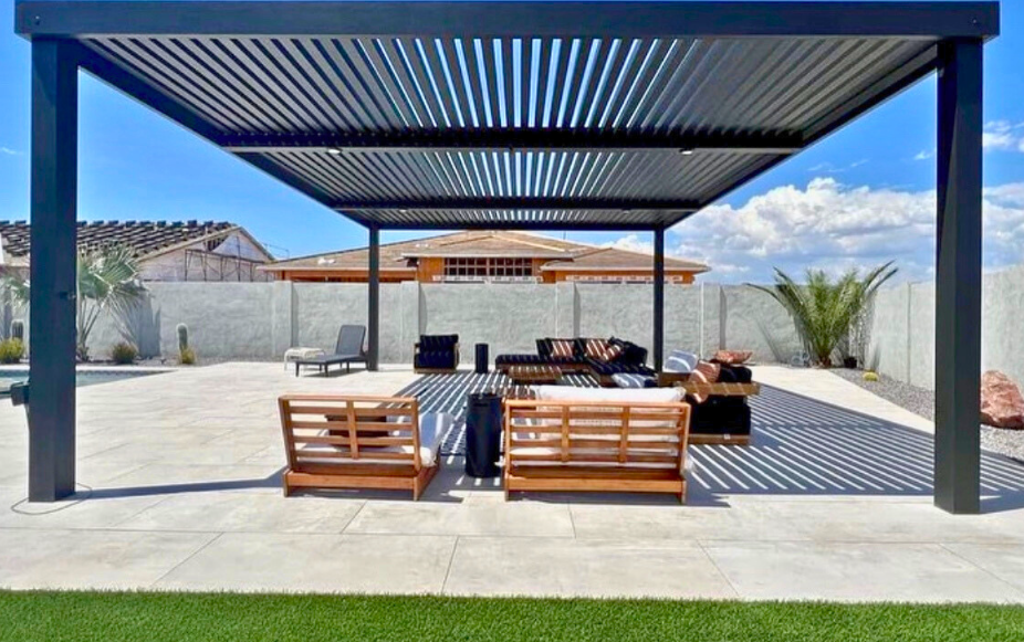 Pergolas Modern aluminum pergola with integrated lighting over large format travertine tile patio built by professional Houston Pergola Builders.