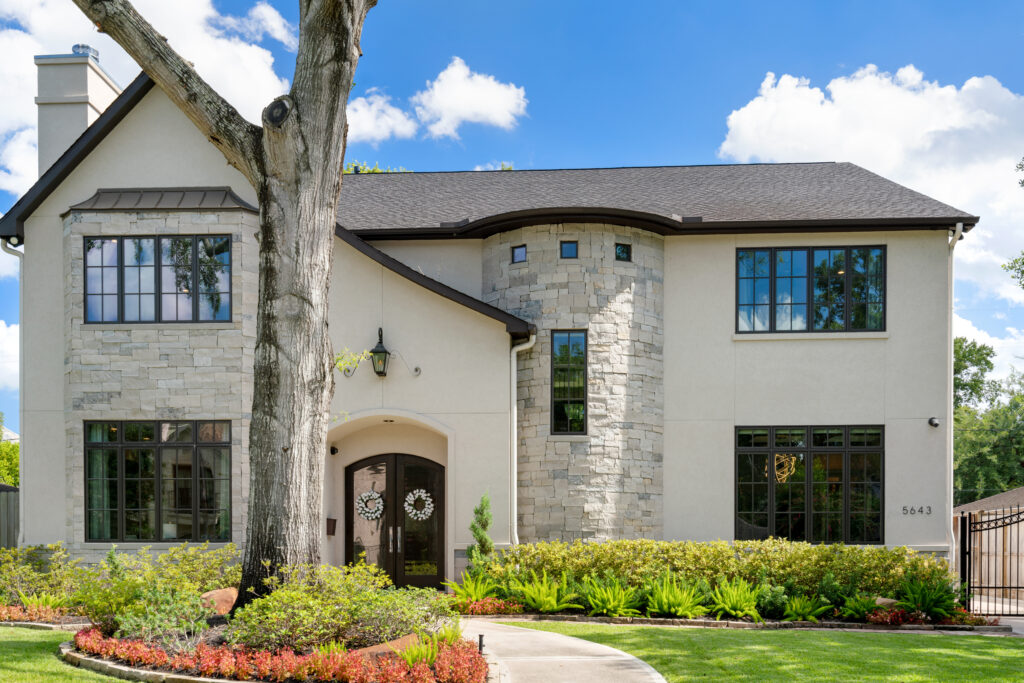 Professional roofing and home remodeling services in Houston by Luxscape, featuring a durable composition roof installation on a traditional home in the Briargrove subdivision.